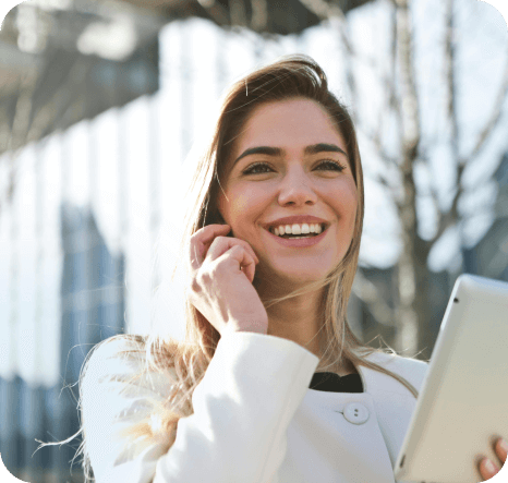 Lady on the phone with tablet in her hand